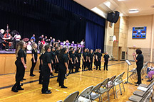 The Flint Hill Childrens Choir (conducted by Janie Brokenicky) performing at auditorium dedication. Image courtesy of Julee Thomas.